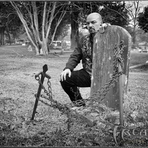 FreakZilla Kneels at an old Grave